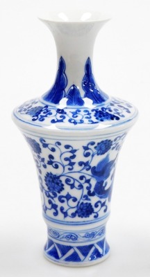 A Chinese porcelain blue and white vase, of wide shouldered form, decorated with a stylised dragon among scrolling peonies, within diaper borders, blue leaf mark to underside, 17cm high. - 4