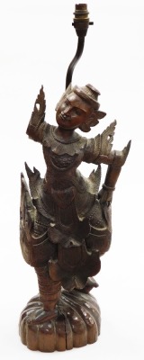 A Thai carved wooden figure of a dancer, on a domed foot, converted to a table lamp (AF), 94cm high overall.