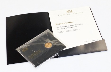 An Elizabeth II 2017 full gold sovereign, in presentation packaging from The Coin Portfolio Management.