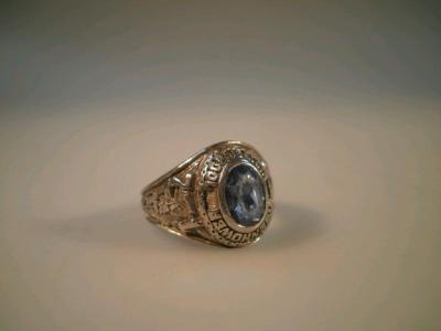 A 10ct American college ring engraved date 1971 with central blue stone