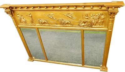 A 19thC gilt over mantel mirror, the inverted break front cornice mounted with spheres, above a Neoclassical frieze of cherubs, a lion drawn chariot, warriors, etc., above three rectangular bevel plates flanked by Corinthian pilasters, 89cm high x 132cm w