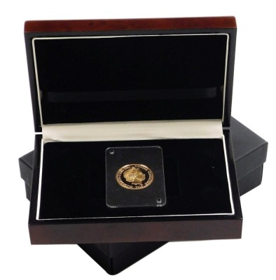 A 2015 Winston Churchill commemorative gold half crown, in fitted box with outer box, lacking certificate.