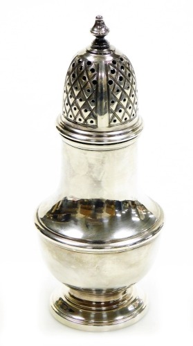 An Elizabeth II silver sugar caster, of baluster form on a stepped base, London 1972, 16cm high, 3¾oz.