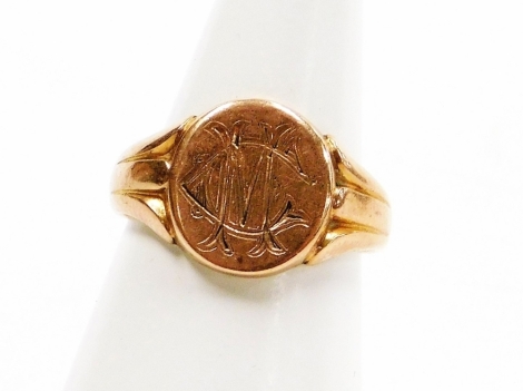 A 9ct rose gold signet ring, with circular ring head on three splayed shoulders, bearing the initials CM, size N, 5.2g all in.