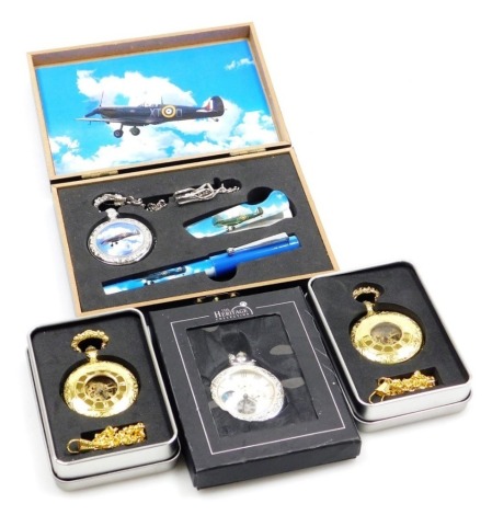 Four modern pocket watches, comprising two circular open work design pocket watches, a Heritage Collection chronograph type pocket watch and a presentation Spitfire case with pocket watch, penknife and matching pen. (4)