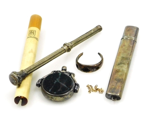 Silver and other trinkets, comprising a silver cigarette case, a silver and agate set swivel fob, a white metal pencil case with citrine top, a dress ring cut and unmarked, and a novelty Maurier cigarette shaped penknife, 18.6g all in. (a quantity)