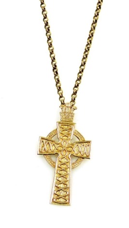 A Celtic cross pendant, surmounted with the Prince of Wales crown and feathers, yellow metal, on a 9ct gold belcher link neck chain, 11.1g all in.
