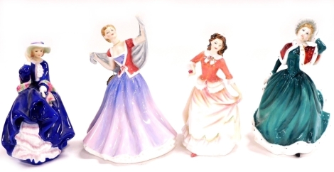 Four Royal Doulton porcelain figures, comprising Top O' The Hill HN3735, Susan HN3871, June HN2991 and Christmas Day HN4315.