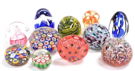 A group of glass paperweights, to include two Millefiori examples. (11)