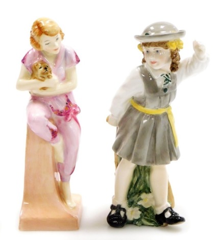 A Royal Worcester porcelain figure, Katie's Day School Time, 16cm high, and a Royal Doulton porcelain figure from The Bathers Collection, Lido Lady, HN4247.