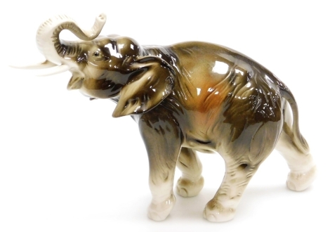 A Royal Dux porcelain figure of an elephant, printed marks, 20cm high.