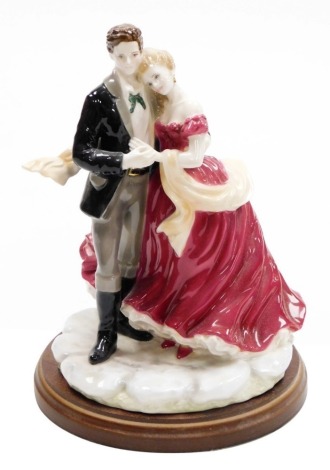 A Royal Worcester porcelain figure group, of True Love Age Of Romance, modelled by Richard Moore, limited edition number 414/500, stamped and dated 1998, 26cm high, boxed with hardwood stand.