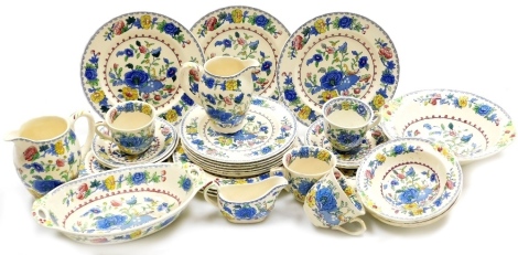 A Masons Regency pattern ironstone part tea and dinner service, comprising four teacups, four saucers, four cake plates, six side plates, six further plates, milk jug, cream jug, gravy jug, four bowls, larger serving bowl and a two handled dish.