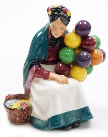 A Royal Doulton porcelain figure, The Old Balloon Seller, HN1315.