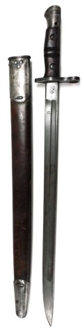 An American Remington 1918 pattern bayonet, in leather scabbard, 58cm long.