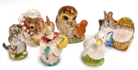 A group of Beswick pottery Beatrix Potter figures, comprising Beswick Miss Moppet, Mrs Rabbit, Hunca Munca, Old Mr Brown, Tiggy Winkle washing, and a Royal Albert figure entitled Rebecca Puddleduck. (1 tray)