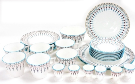 A Royal Crown Derby part breakfast service, with blue borders and flowers in the Drop pattern, circa 1880, comprising six cups and saucers, six side plates, two dinner plates, serving plate, bowl and six egg cups.