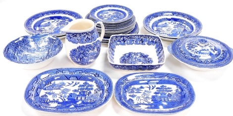 A group of blue and white pottery, to include various Wedgwood & Co Willow pattern wares, tureen and cover, various dinner plates, side plates, a Mason's Vista pattern jug, a Wedgwood Dickens Coaching Days bowl, etc. (a quantity)