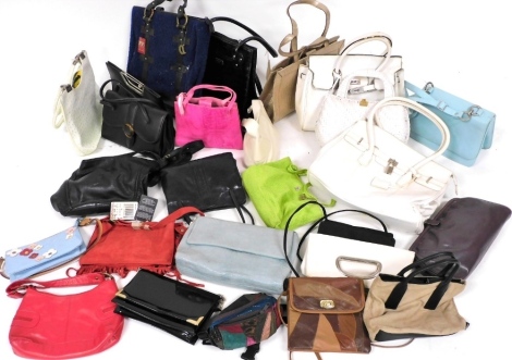 A large group of handbags, to include an Osprey London of black leather shoulder bag, a Dents boucle fabric and black leather bag, a white woven plastic top handled bag, with gold coloured hardware, a faux ostrich skin green leather top handled bag, etc. 