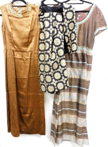 Three items of 1970's clothing, comprising a brown silk A line dress, with gold thread work and sequined collar, size unknown, a brown silk Eastern style full length short sleeve dress, with turquoise and gold thread banding, size unknown, and a Spectator