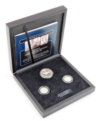 A Britain's Longest Reigning Monarchs silver coin set, with certificate of authenticity, etc.