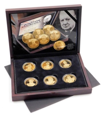 A Winston Churchill gold plated six coin set, with certificate and original packaging.