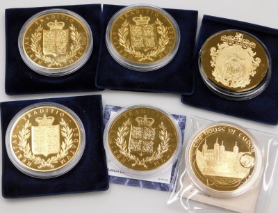 A group of Royal related gold coloured coins or medallions, to include two Golden Wedding issues, and further coins. (a quantity) - 3