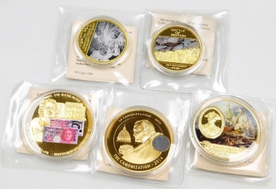 A group of Royal related gold coloured coins or medallions, to include two Golden Wedding issues, and further coins. (a quantity) - 4