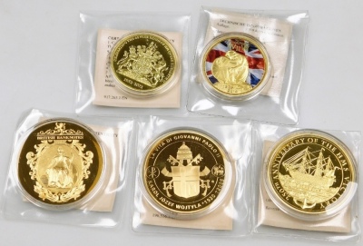 A group of Royal related gold coloured coins or medallions, to include two Golden Wedding issues, and further coins. (a quantity) - 5