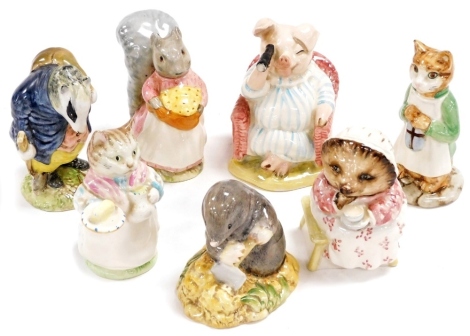 A group of Beswick Beatrix Potter figures, comprising Ribby, Goody Tiptoes, Tommy Brock, Little Pig Robinson Spying, Mrs Tiggy-Winkle Takes Tea, Diggory Diggory Delvet and Ginger. (7)