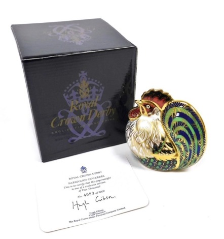 A Royal Crown Derby porcelain Farmyard Cockerel paperweight, limited edition no. 4093/5000, with gold stopper and red printed marks, 10cm high, boxed with certificate.