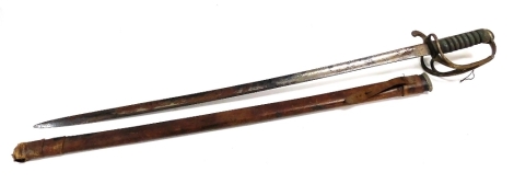 A George V World War I period cavalry officer's sword, with wire bound shagreen type grip and engraved steel blade, with leather scabbard, the blade 82cm wide.