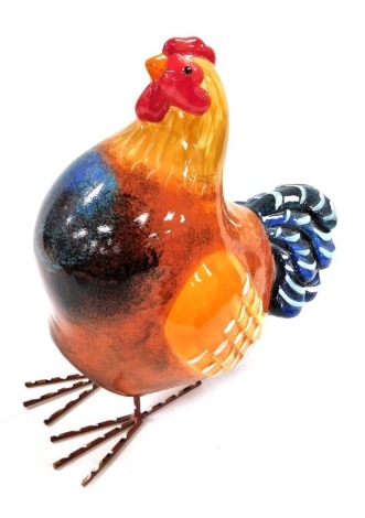 A Rooster & Hen pottery figure of a chicken, with articulated wire feet, printed marks, 25cm wide.