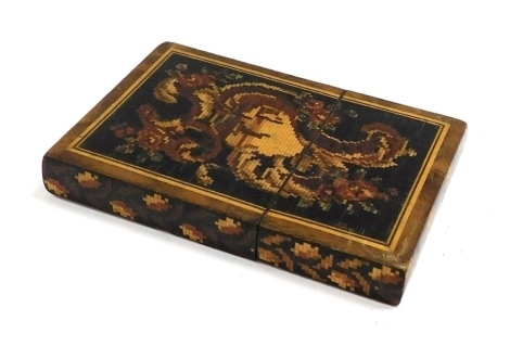 A Victorian Tunbridge ware calling card case, decorated to the front with a rococo cartouche, verso with geometric parquetry, 11cm high, 8cm wide.