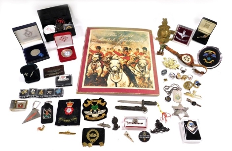 Militaria. Badges, commemorative coins, car badges, etc. (a quantity)