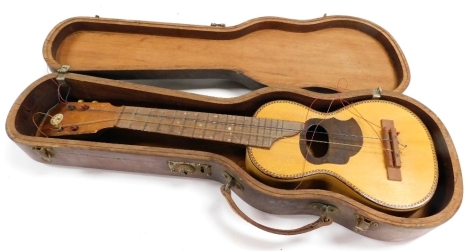 A S Rose and Company of Bombay Limited ukulele, cased.