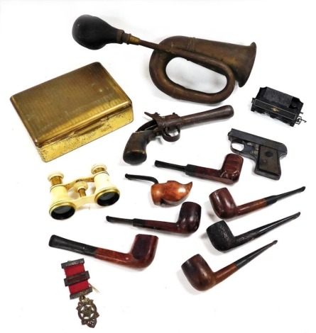 Mixed collectibles, including a silver Masonic jewel, ivory bound opera glasses, brass car horn, briar wood pipes, and a brass cigarette box. (a quantity)