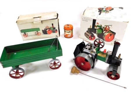 A Mamod steam roller, together with an open wagon, both boxed. (2)