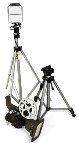 A Bell and Howell 8mm projector model 606M, Prinz Supa-lite 1000, on a Berkey Colortran tripod stand, and a Vanguard tripod stand.