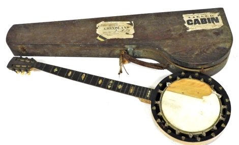 An early 20thC wooden cased banjo, cased, bearing paper labels for P&O Steam Ship Navigation Company and Grindlays of London.