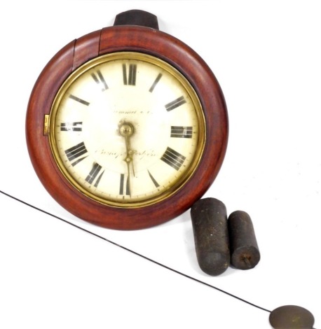 A Victorian mahogany cased wall clock by Hummel and Company, Bishops Stortford, circular dial bearing Roman numerals, two train movement, 32cm wide.