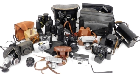 Cameras and binoculars, including a Hellina camera, Yashica J camera, and Miranda 16x50 binoculars. (a quantity)