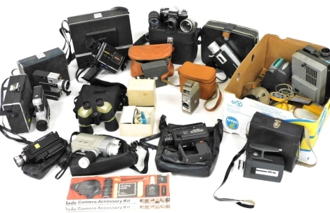 Cine cameras and 8mm movie cameras, including a Bell & Howell two fifty two 8mm camera, and a Mansfield Holiday automatic zoom 8mm camera, all cased, together with a Polaroid flash gun 268, camera accessories kit, slide projector and sundries. (a quantity