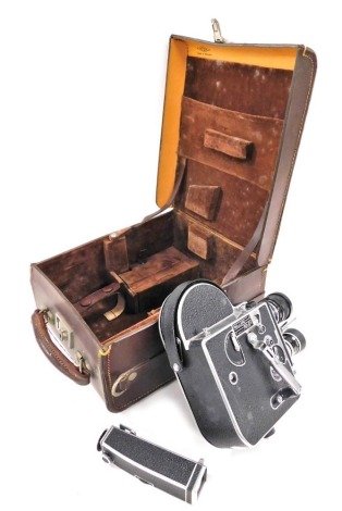 A Paillard Bolex H16 reflex 16mm cine film camera, with three Kern Paillard lenses, cased.