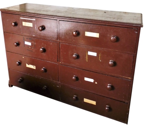 A Victorian brown painted pine chest, of eight long drawers, raised on a plinth base, 112cm high, 162cm wide, 50cm deep.