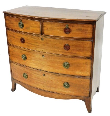 A George III mahogany bow front chest, of two short over three long drawers, raised on splayed feet, 103cm high, 107.5cm wide, 54cm deep.