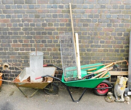 Two wheel barrows, various garden tools, a concrete garden statue of a dog, 52cm high, etc. (a quantity)