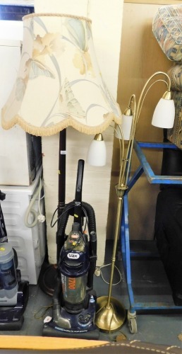 A Vax Turbo Force 1700 upright vacuum cleaner, and two standard lamps. Buyer Note: WARNING! This lot contains untested or unsafe electrical items. It is supplied for scrap or reconditioning only. TRADE ONLY