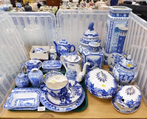 A group of blue and white ceramics, to include Oriental vase decorated with flowers, 33cm high, jar and cover, 22cm high, teapots, Spode mug, a George Jones & Sons rectangular dish, 16cm wide, various plates, etc. (a quantity)