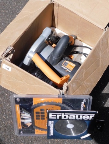 An Evolution circular saw and spare blades, boxed. Note: VAT is payable on the hammer price of this lot at 20%.